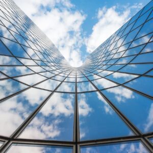 A view of the sky through an office building.