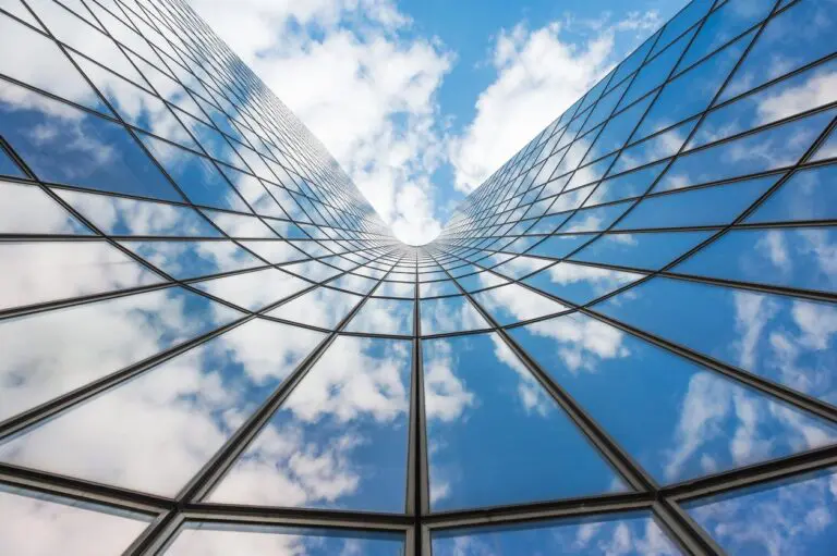 A view of the sky through an office building.